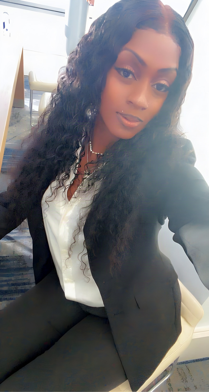 Janay Lewis wearing Business casual