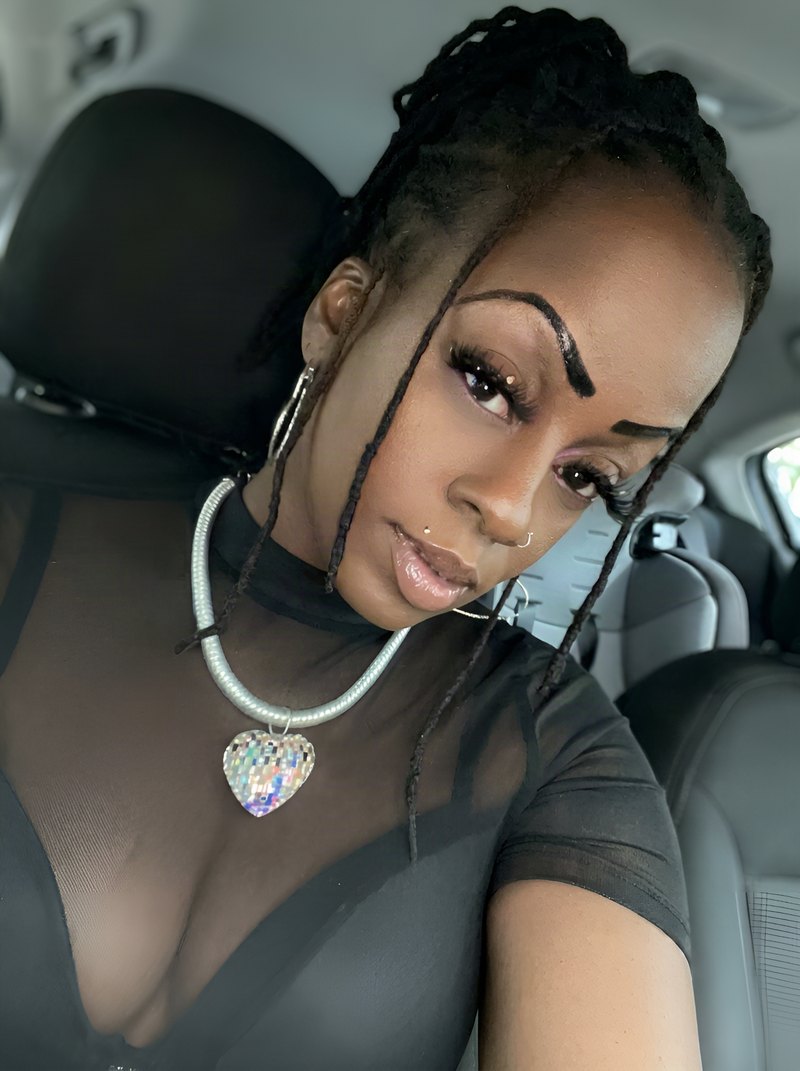 Janay Lewis wearing Braids pulled back