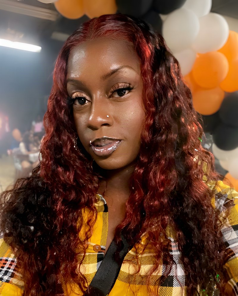 Janay Lewis wearing Auburn curls