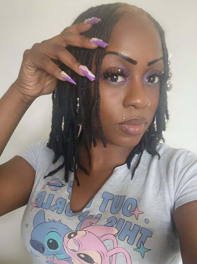 Janay Lewis wearing Black locs bob