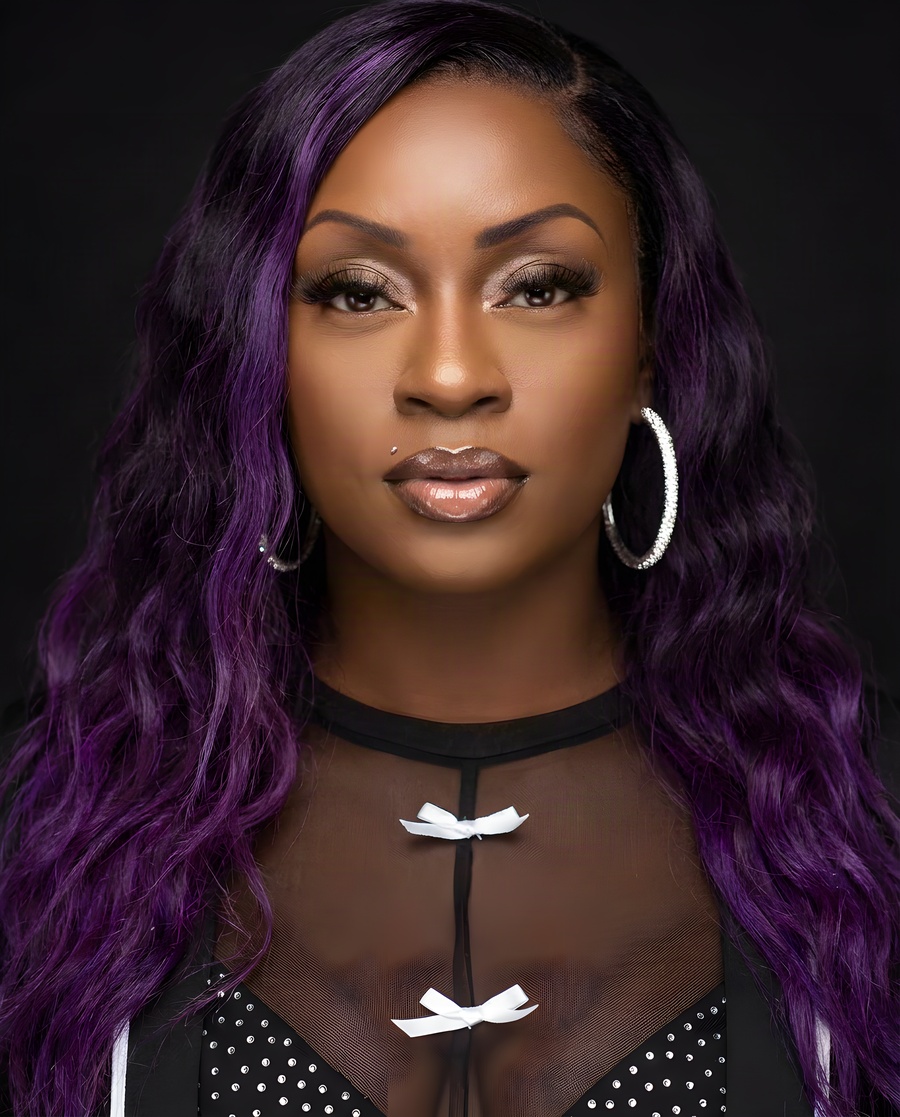 Janay Lewis wearing Purple reign
