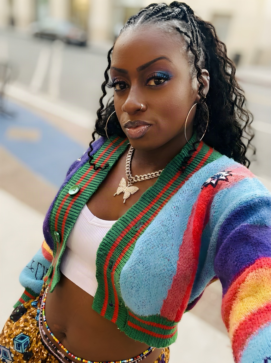Janay Lewis wearing Rainbow braids